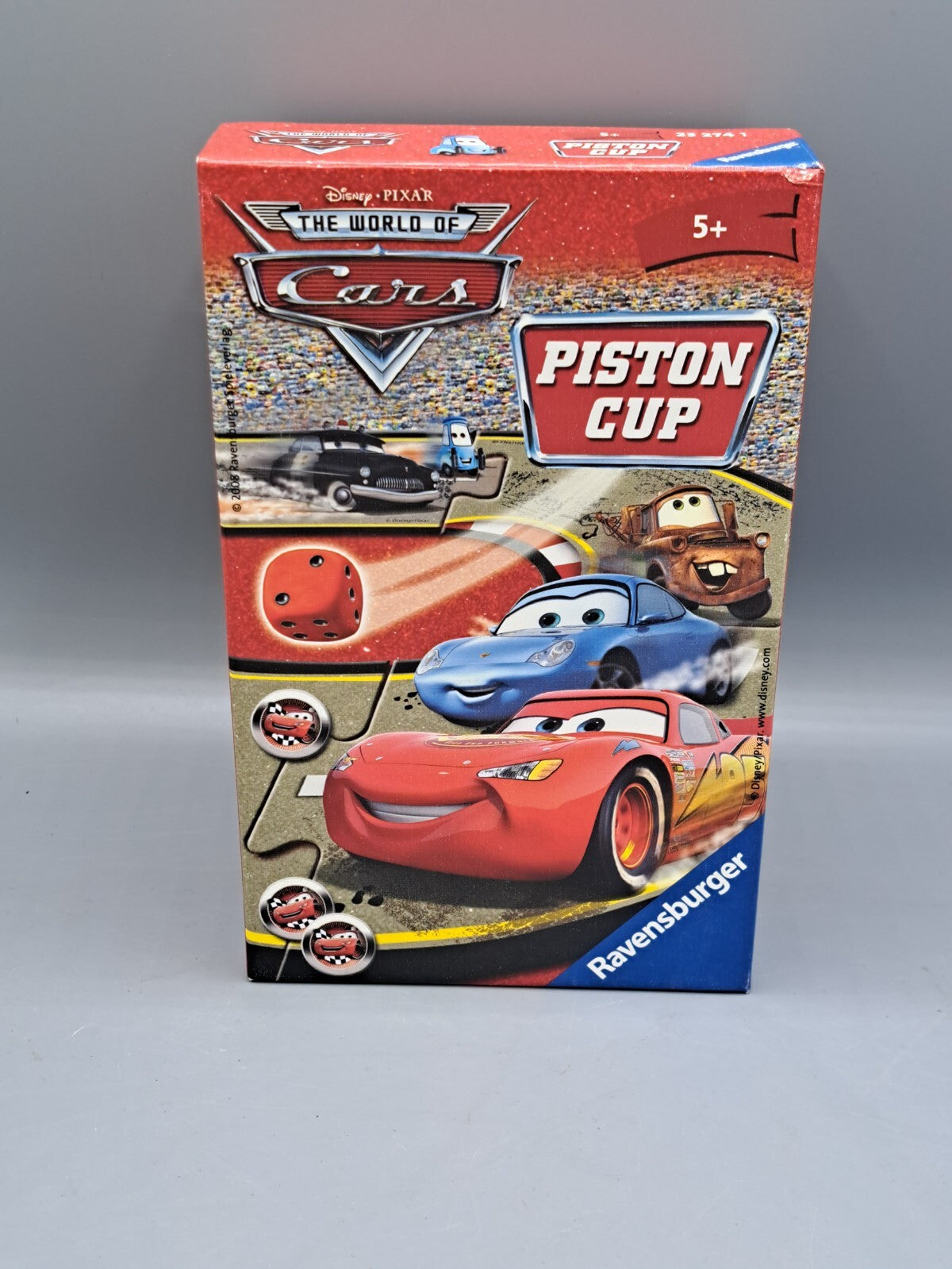 Ravensburger 23274 - Disney/Pixar Cars Piston Cup, Mitbringspiel für 2-4...
