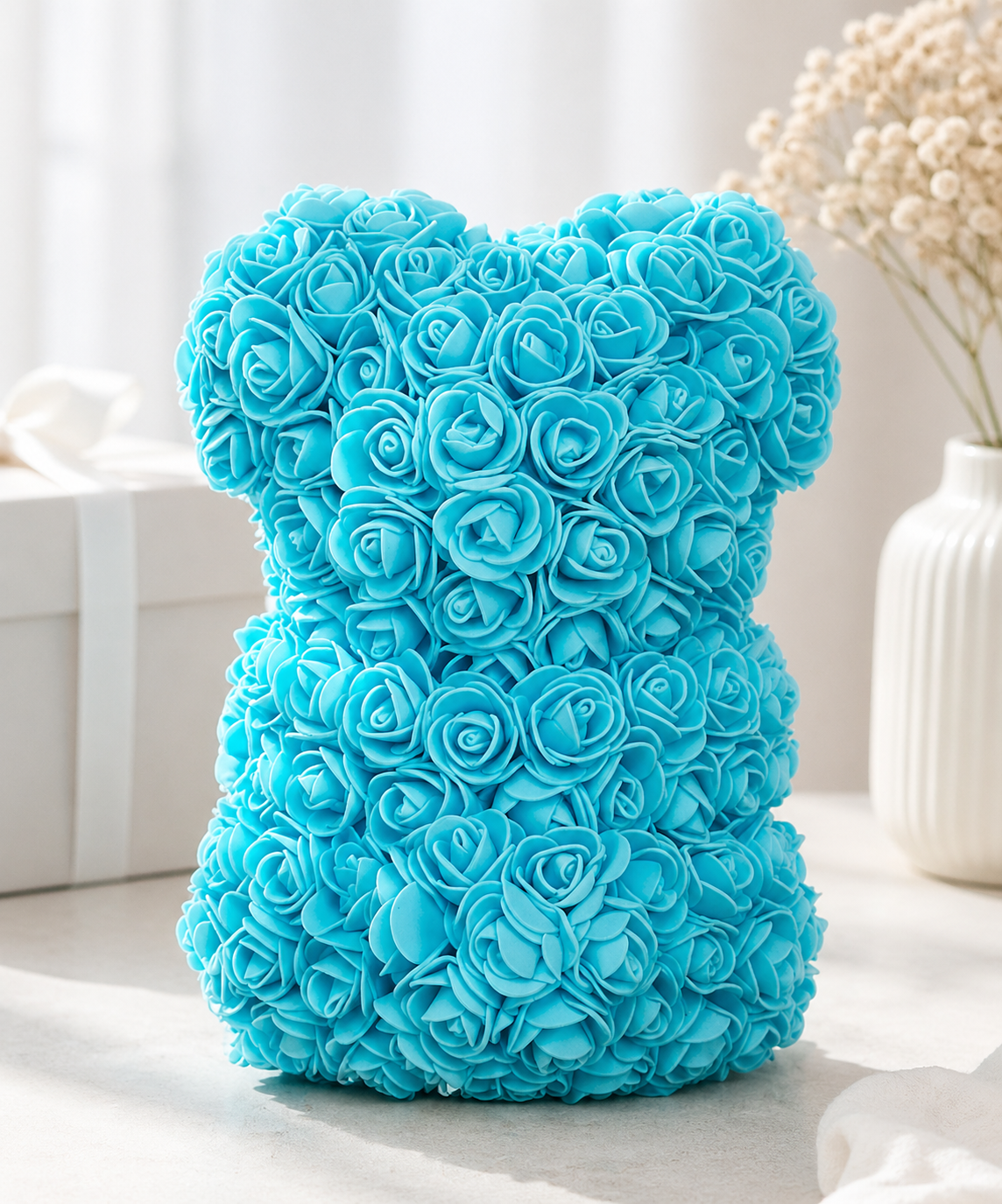 Brandsseller Rosenbär 25x16 cm Kunstblumen Teddybär Blau Geschenk