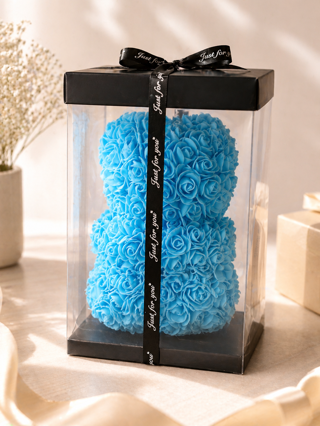 Brandsseller Rosenbär 25x16 cm Kunstblumen Teddybär Blau Geschenk